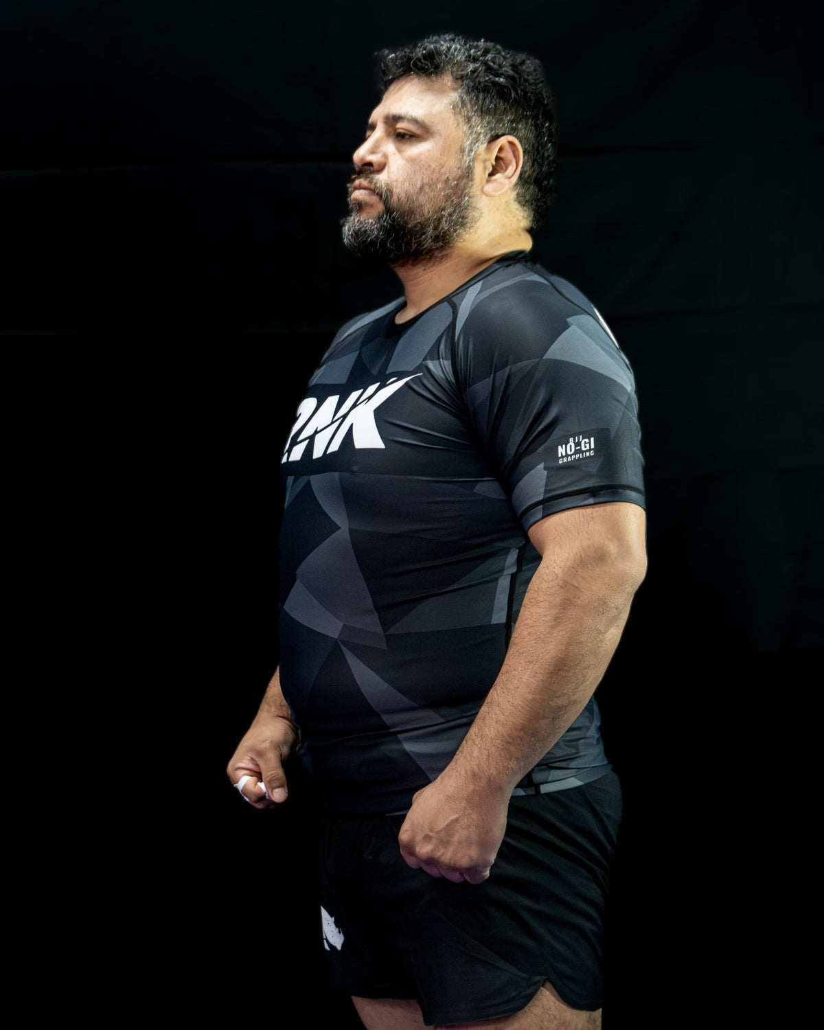 Rashguard Héroe · Geométrico Negro